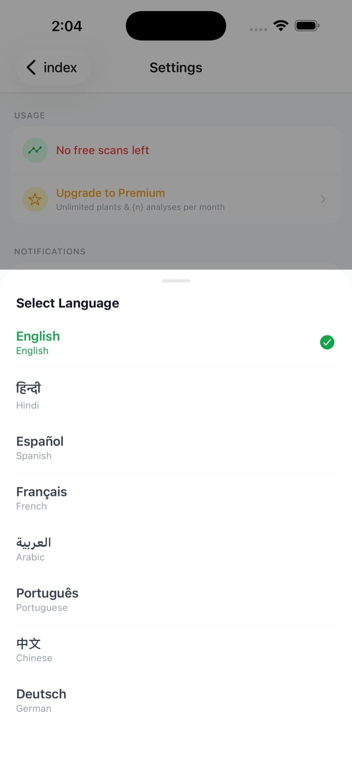 Language selector offering eight languages including English, Hindi, Spanish and Arabic